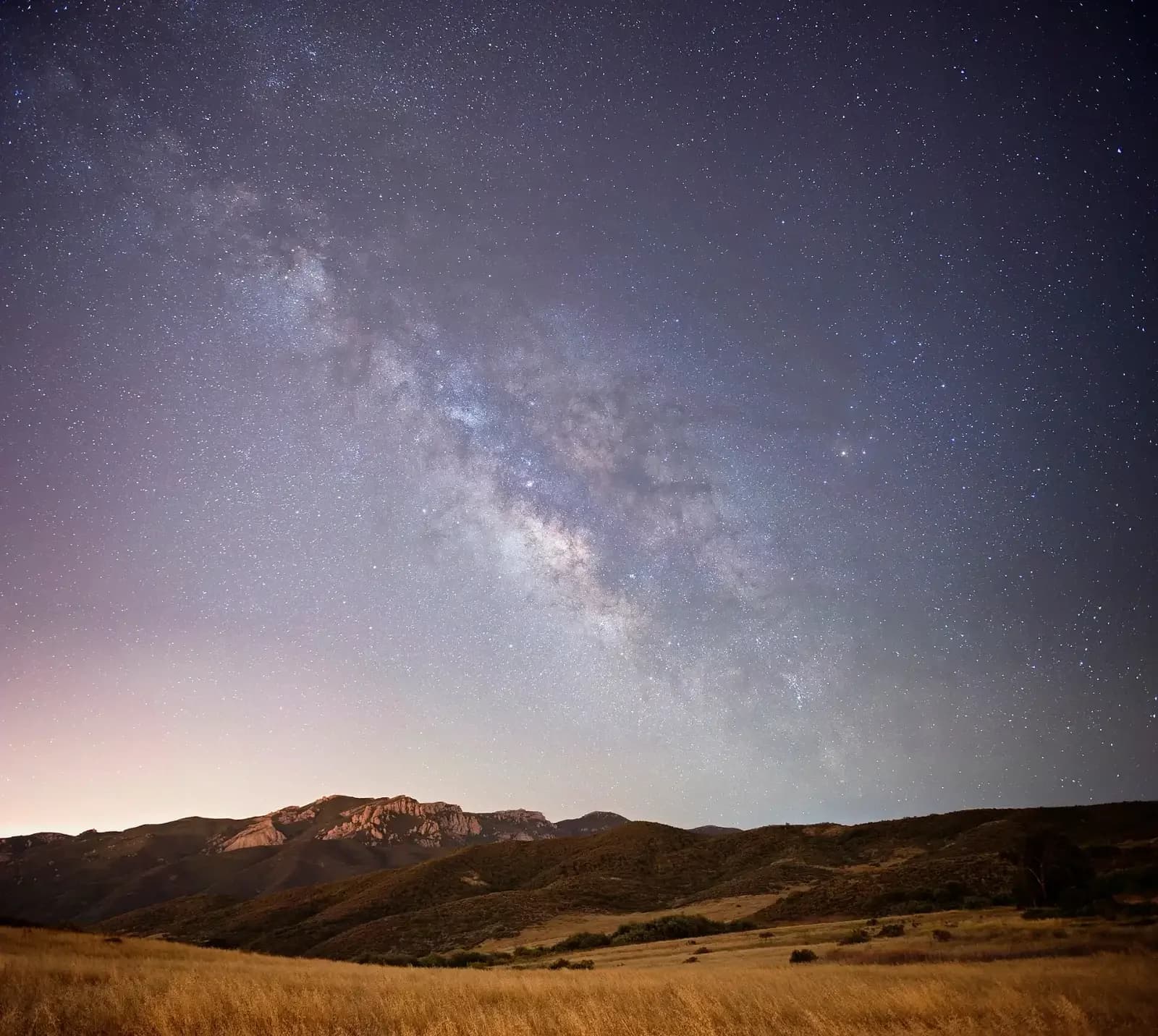 The Milky Way over the hills at night